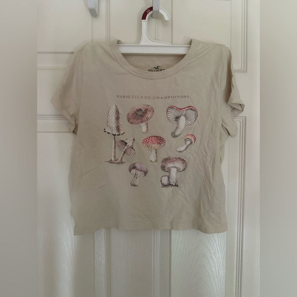 Hollister Cream Women’s Tee with Mushroom Design